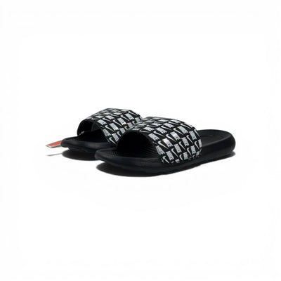 ⚫⚪ Nike All-Over Logo Slides – Streetwear Statement Edition