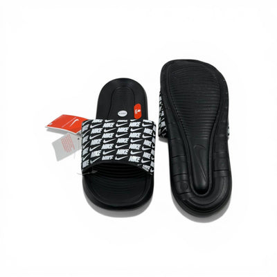 ⚫⚪ Nike All-Over Logo Slides – Streetwear Statement Edition