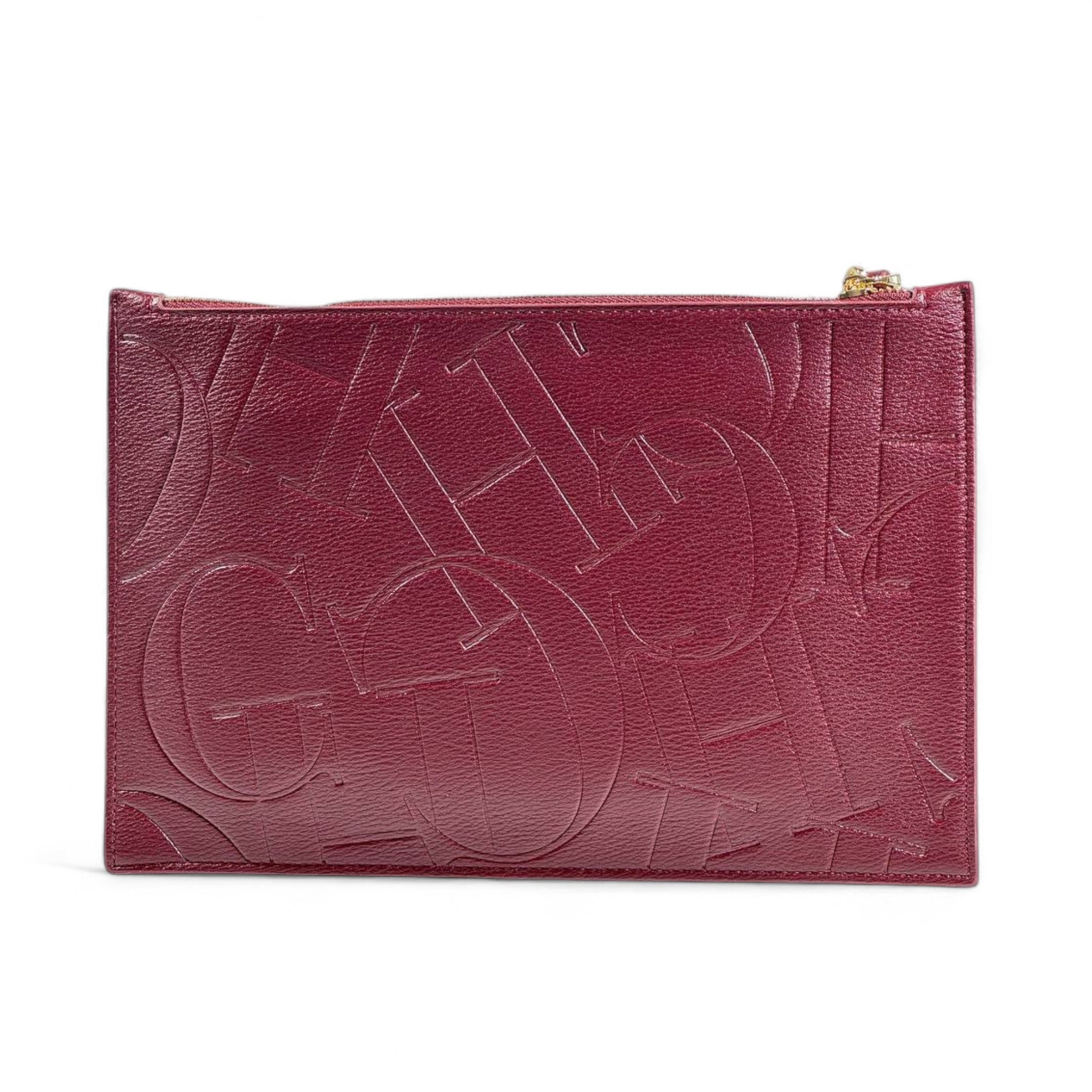 CH Carolina Herrera Burgundy Embossed Clutch 🍷✨ | Monogram Design • Elegant Wrist Strap