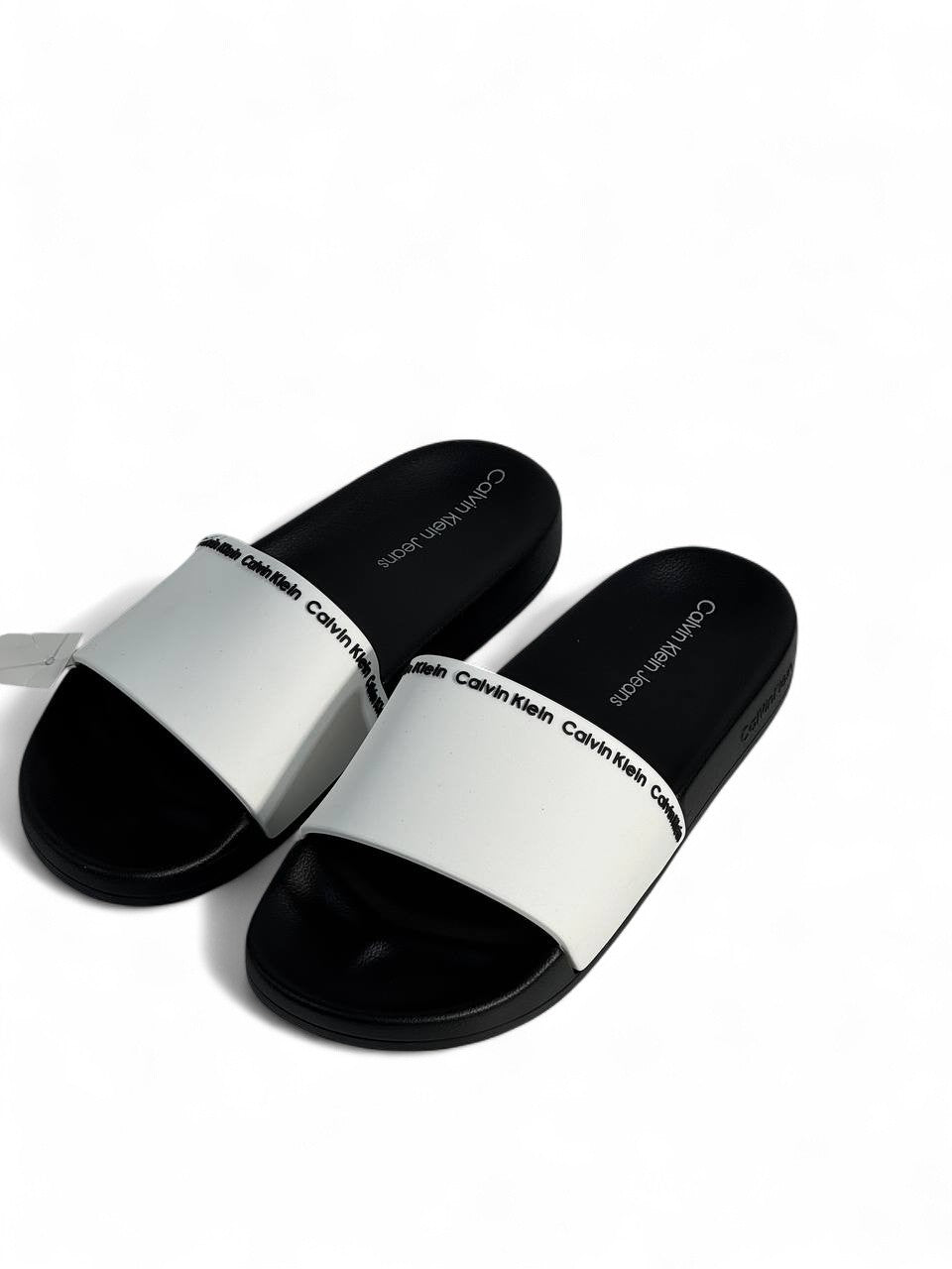 Calvin Klein Jeans Men’s Slides – White & Black 🖤🤍 | Modern Summer Comfort ☀️👟