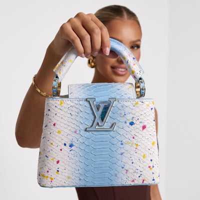 Louis Vuitton small top-handle bag in sky blue and white with paint splatter and gold hardware