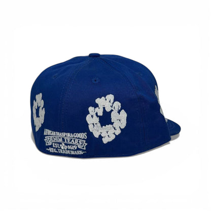 🧢 Denim Tears Royal Blue Flat Brim Cap – Iconic Cotton Wreath Design 💙🌼