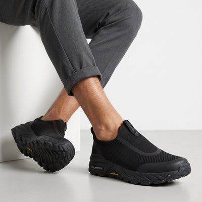 black Skechers slip-on knit sneakers with Goodyear sole