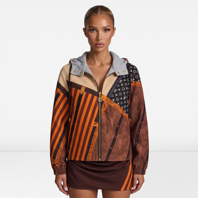 Louis Vuitton patchwork bomber jacket with orange stripes and monogram panels, zip front and grey hood