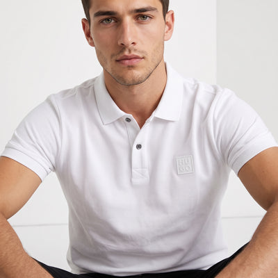 White Hugo short-sleeve polo with embossed logo on chest
