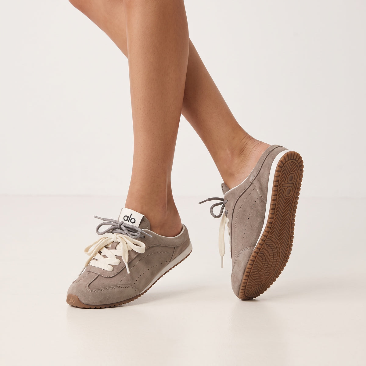 Taupe Alo low-top sneakers with gum sole and white accents
