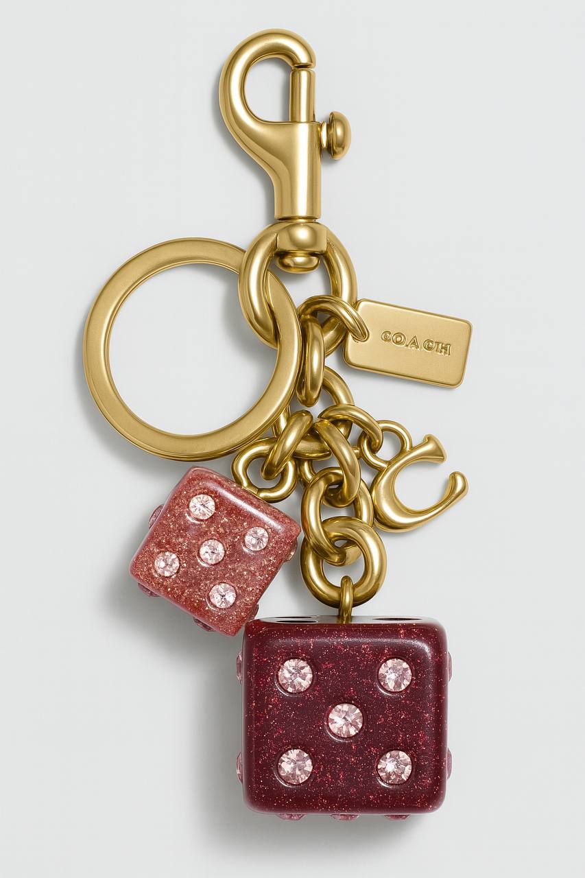 🎲 Coach Lucky Dice Keychain – Gold with Pink Sparkle Charm ✨