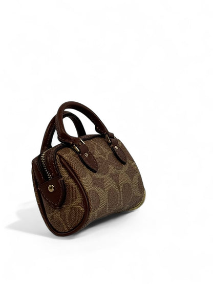 🤎 Coach Mini Signature Brown Bag Charm – Timeless Chic in Mini Form 👜