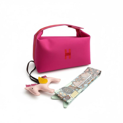 👜✨ Hermès Mini Top-Handle Bag with Scarf & Charm – Pink