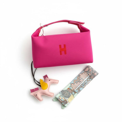 👜✨ Hermès Mini Top-Handle Bag with Scarf & Charm – Pink