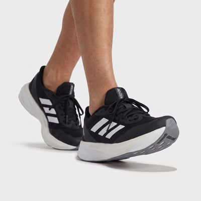 Black Adidas Adizero running sneaker with white midsole and three stripes