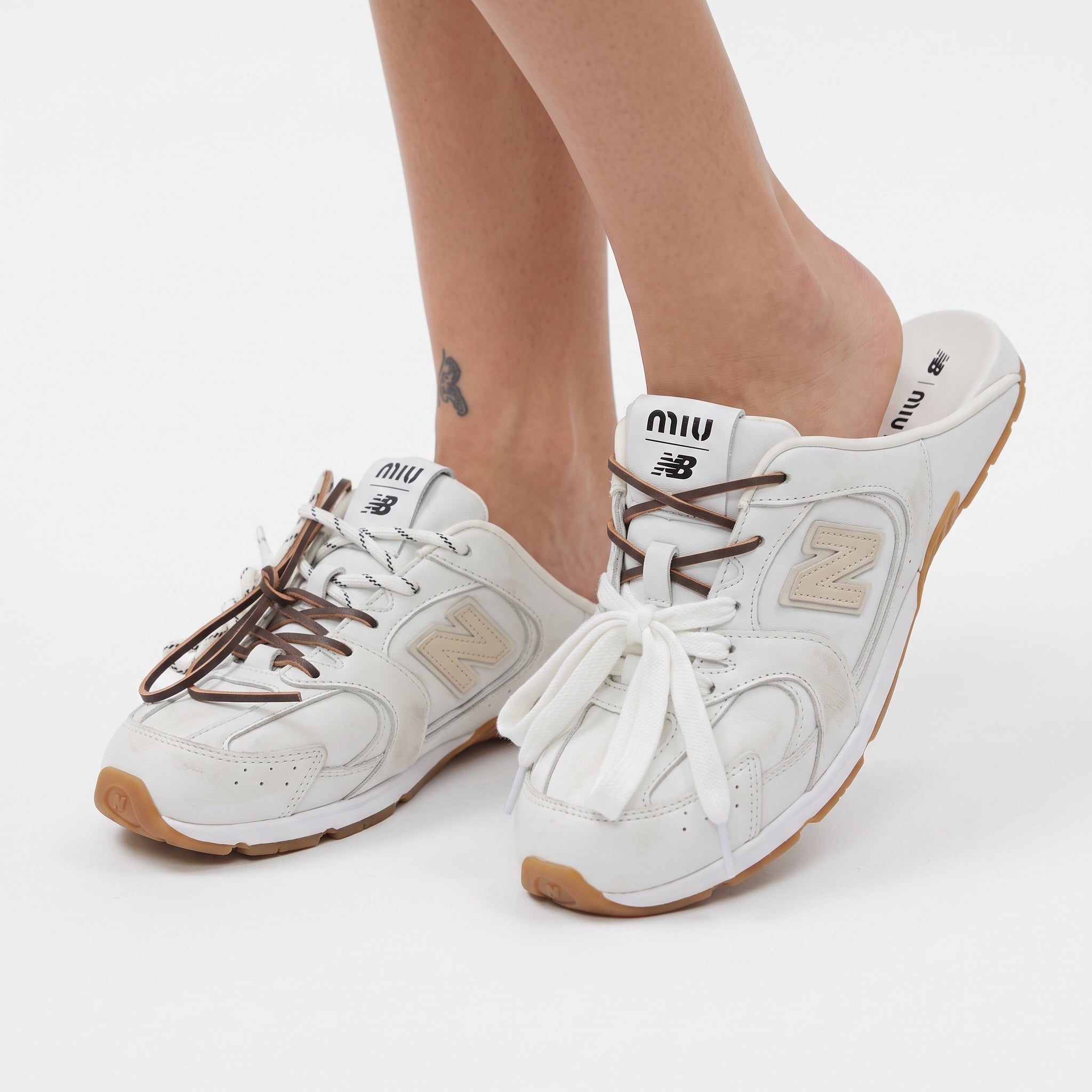 Miu Miu x New Balance white mule sneakers with gum sole and mixed laces