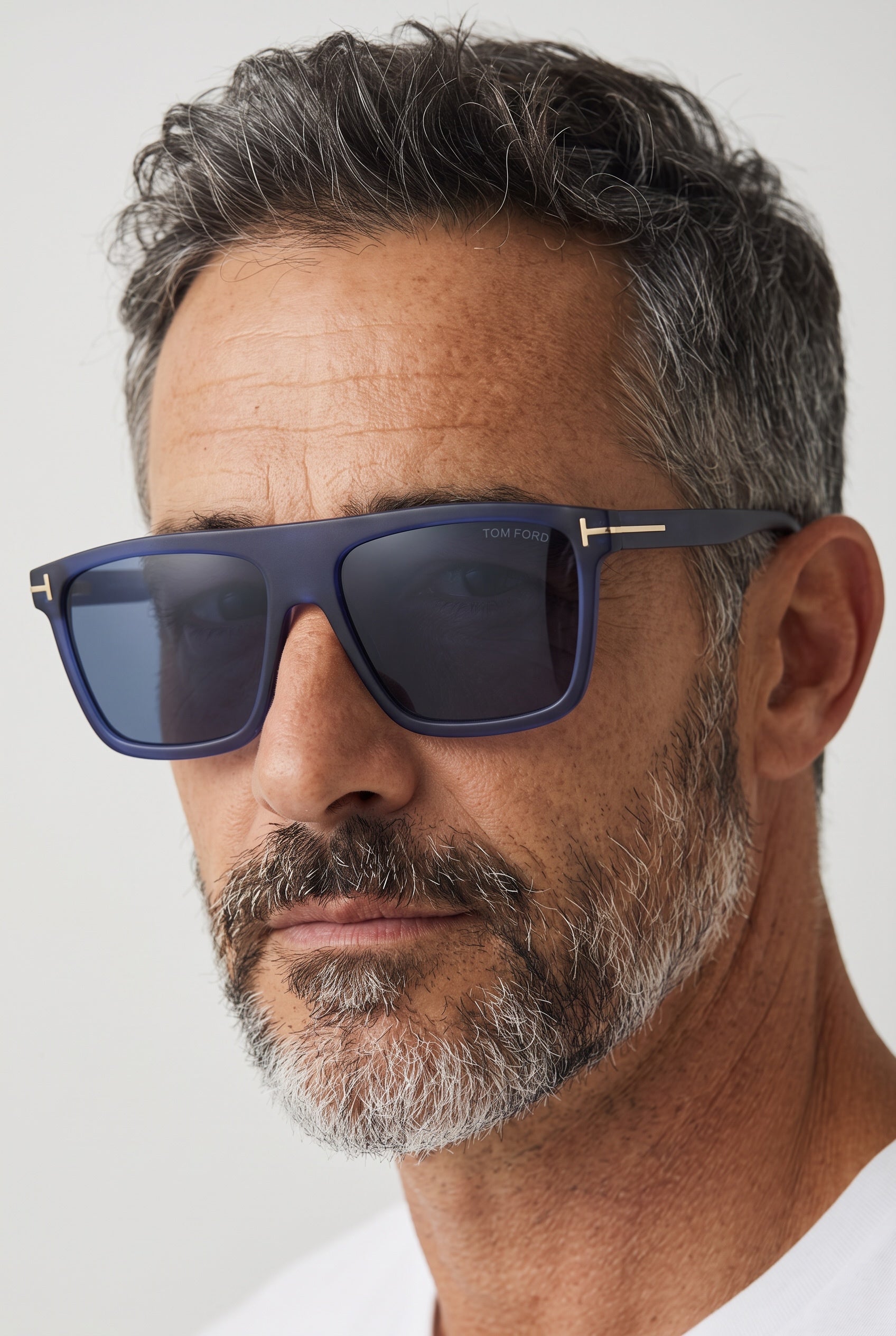 Tom Ford navy matte square sunglasses with gold T logo on temple