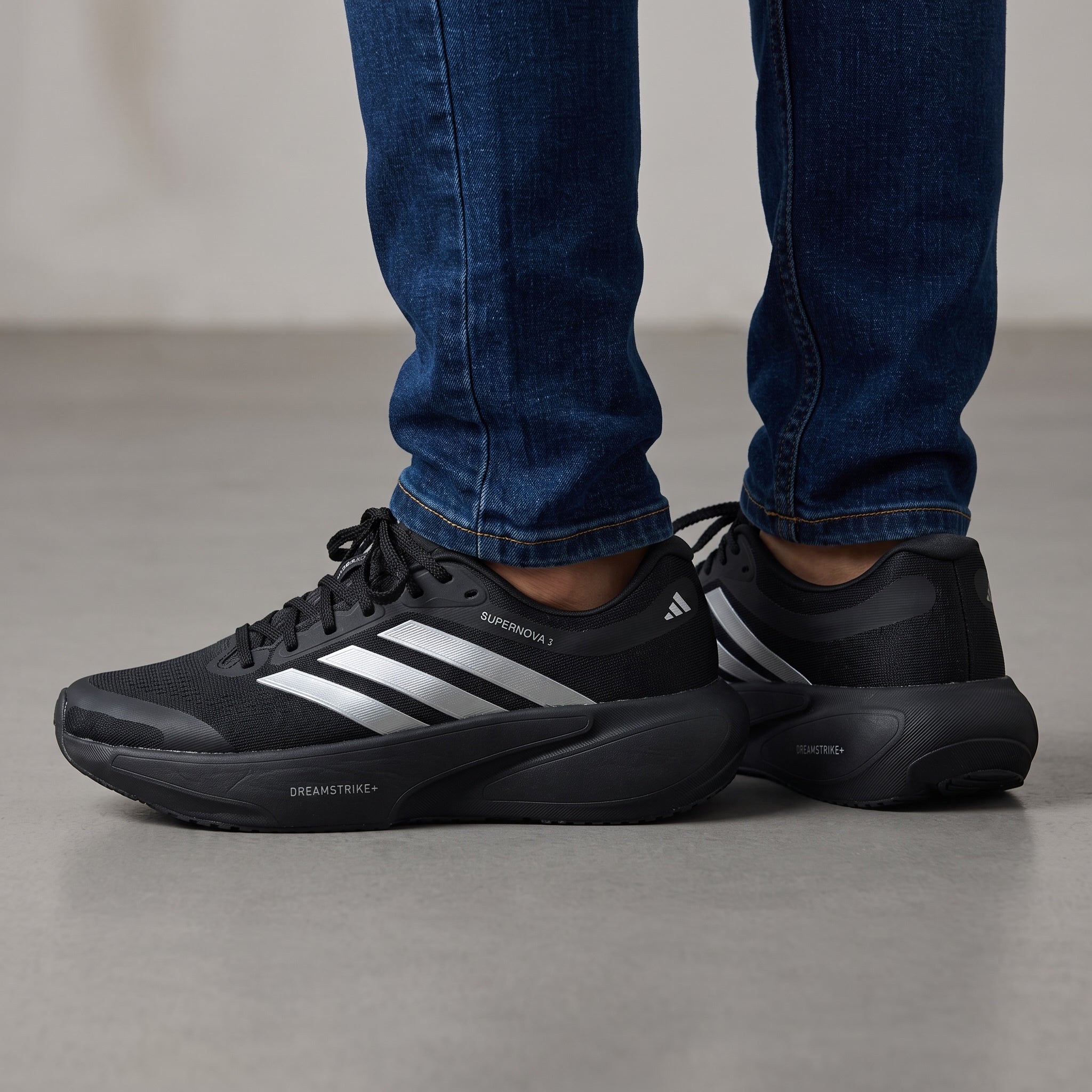 adidas supernova rise 3 black sneakers with silver stripes