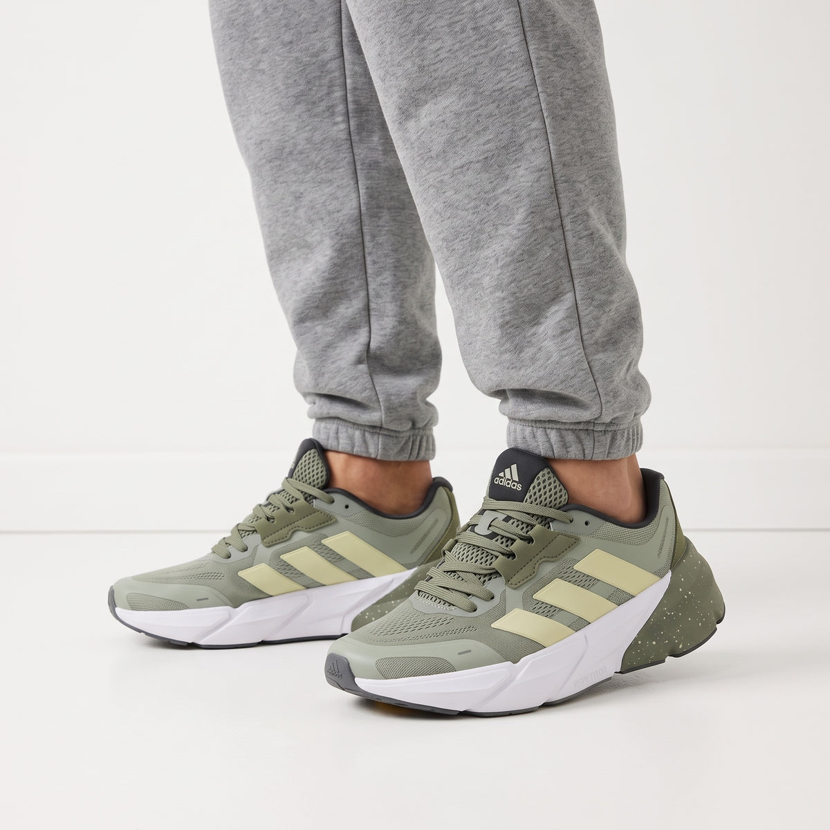 olive green adidas chunky sneakers with speckled midsole