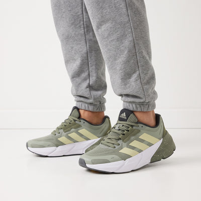 olive green adidas chunky sneakers with speckled midsole