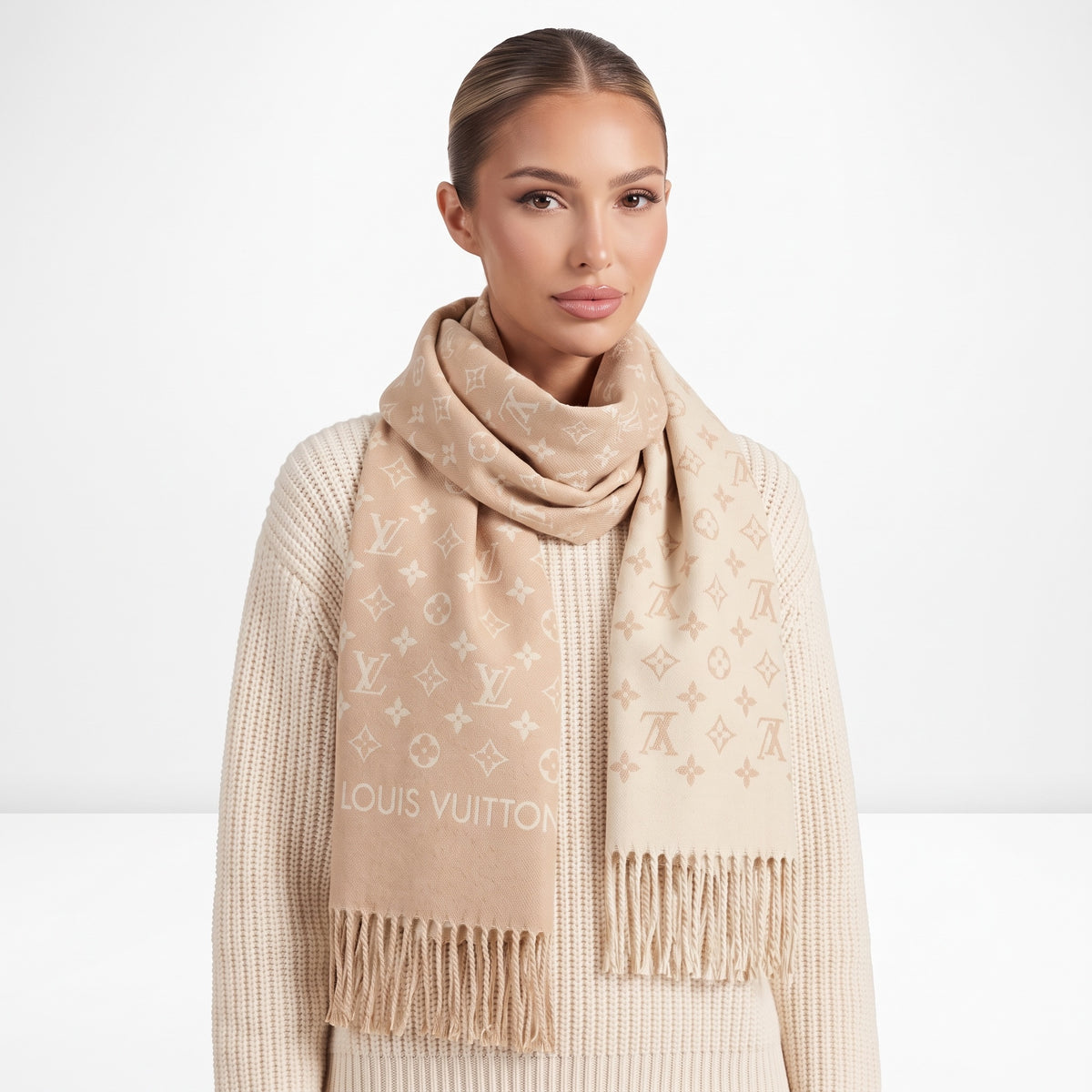 Beige Louis Vuitton monogram shawl with fringed ends draped around model