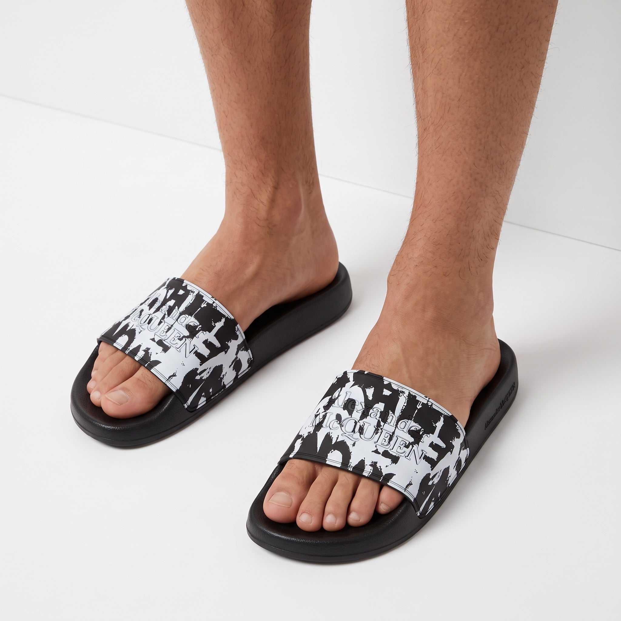 Men's Alexander McQueen black and white printed slide sandals