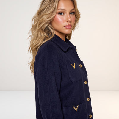 navy women's wool jacket with gold V hardware and gold buttons