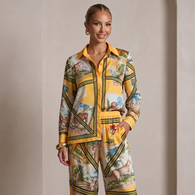 Yellow printed two-piece pajama set with button shirt and wide-leg trousers