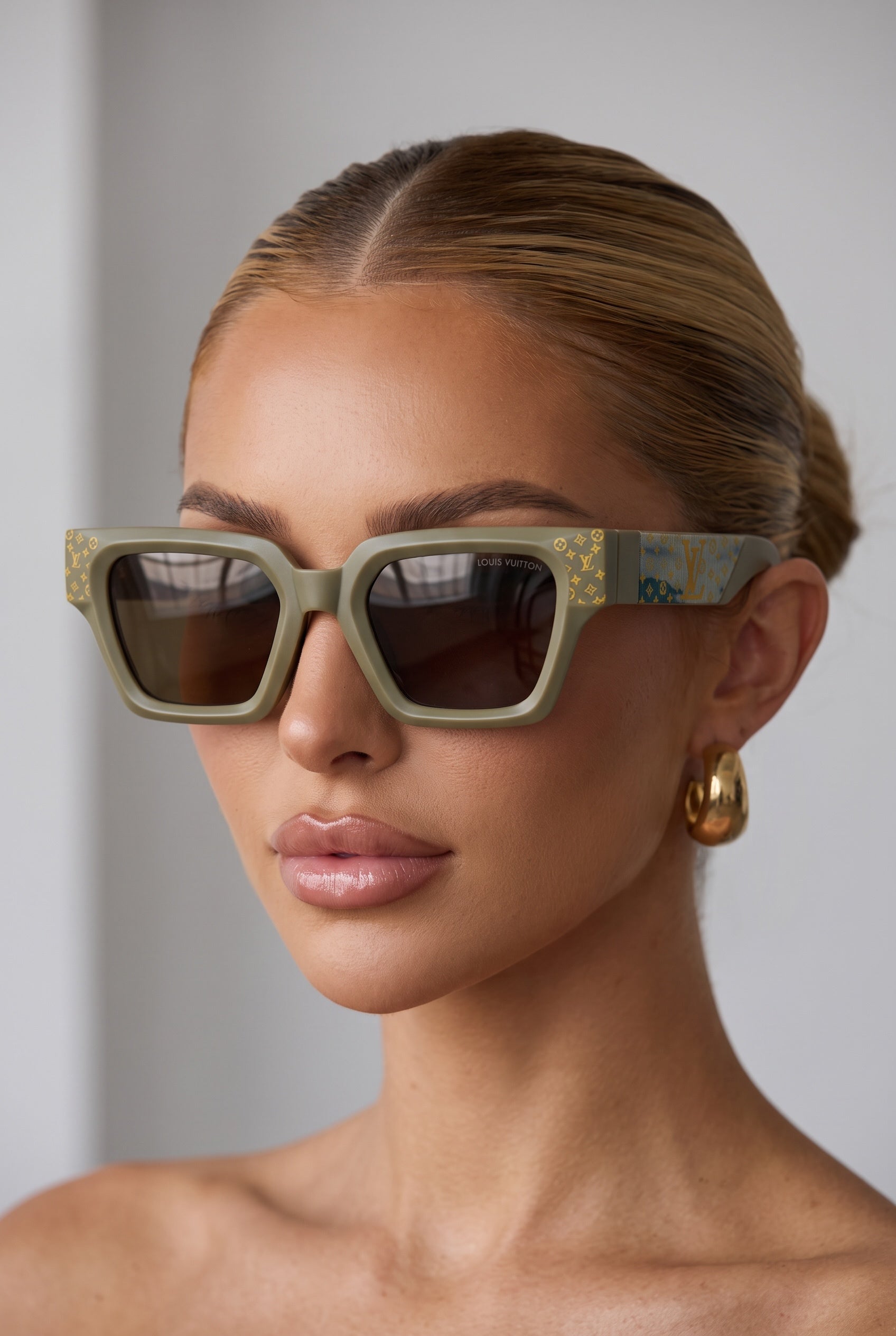 Olive square Louis Vuitton sunglasses with gold monogram on temples