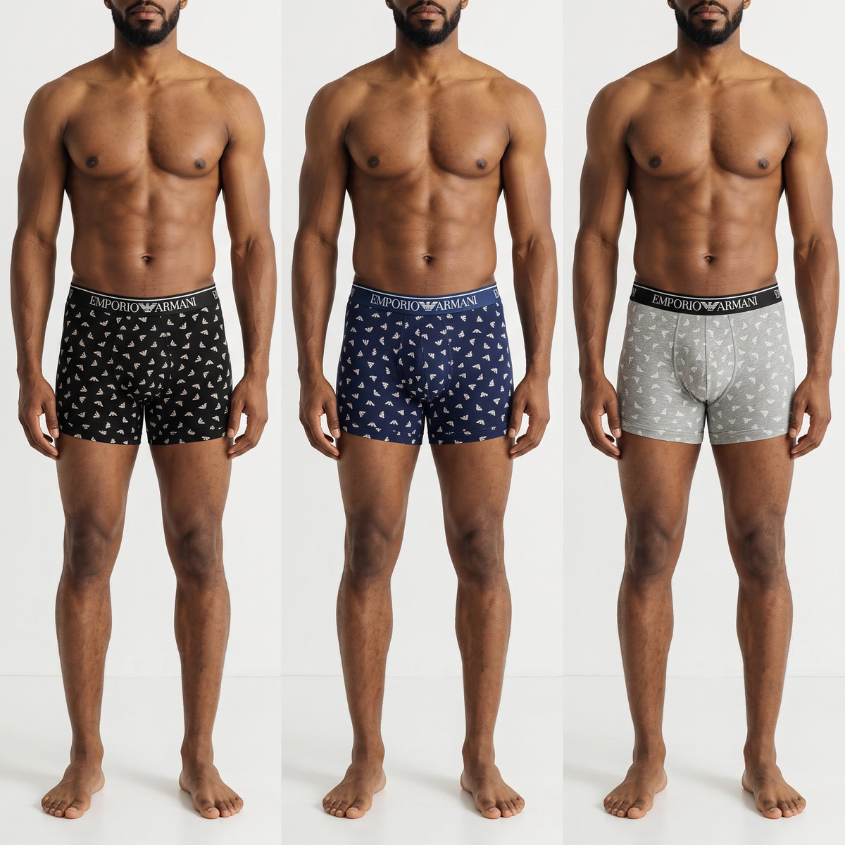 Three Emporio Armani boxer briefs with all-over eagle logo in black navy and grey on male model