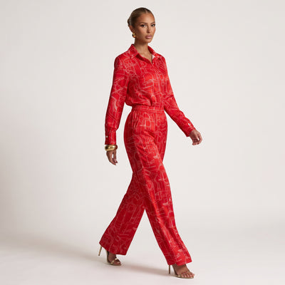 Red long-sleeve button-up shirt with white equestrian line print