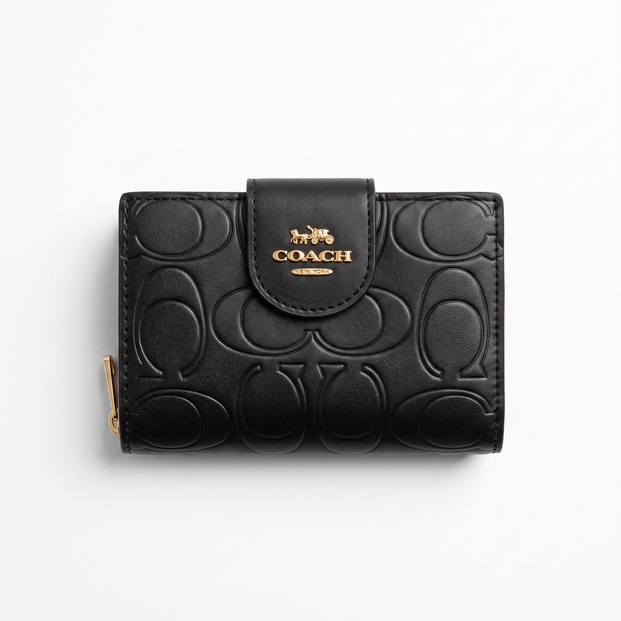 Black Coach small wallet with embossed signature C pattern and gold Coach logo and snap flap