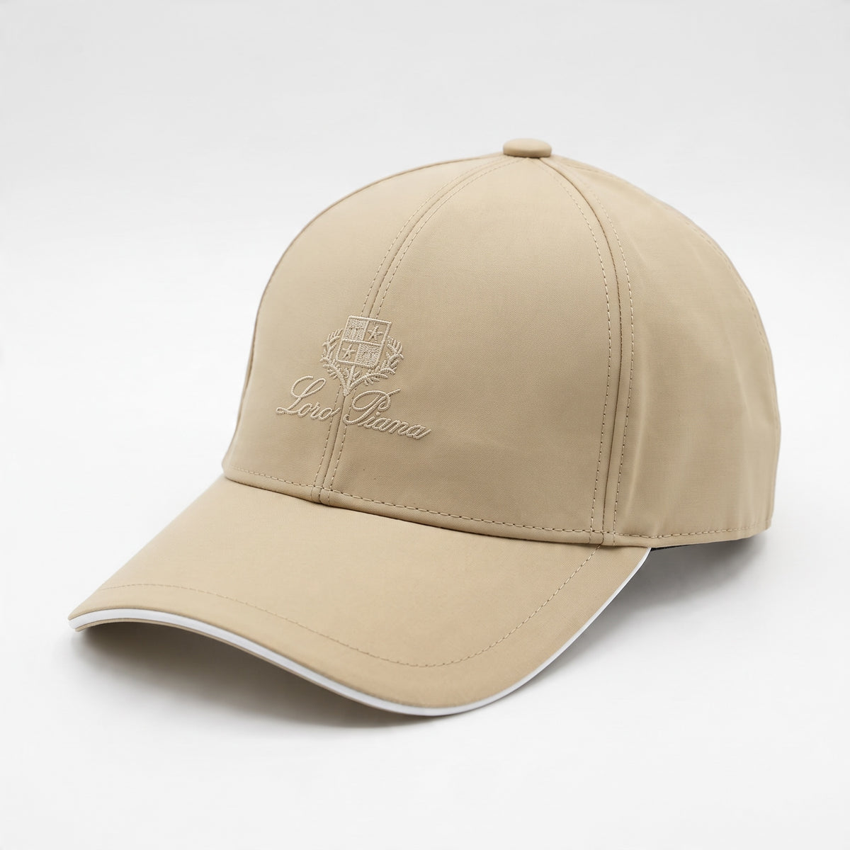 beige Loro Piana baseball cap with embroidered crest and curved brim