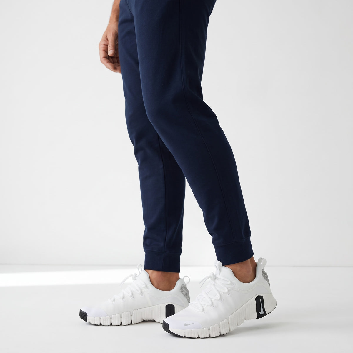 White Nike chunky trainers with sculpted sole and black tread