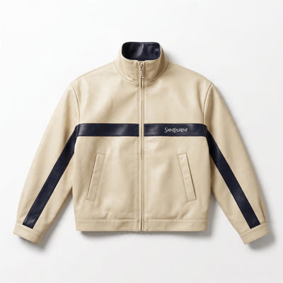 Beige leather jacket with navy chest stripe and sleeve panels, Saint Laurent logo and YSL zip pull