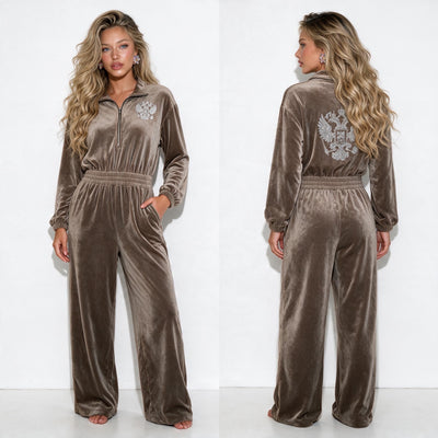 taupe velour jumpsuit with half zip collar, elastic waist, wide legs and embellished crest on chest and back
