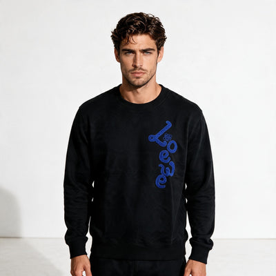 Black Loewe crewneck sweatshirt with blue vertical logo on right side