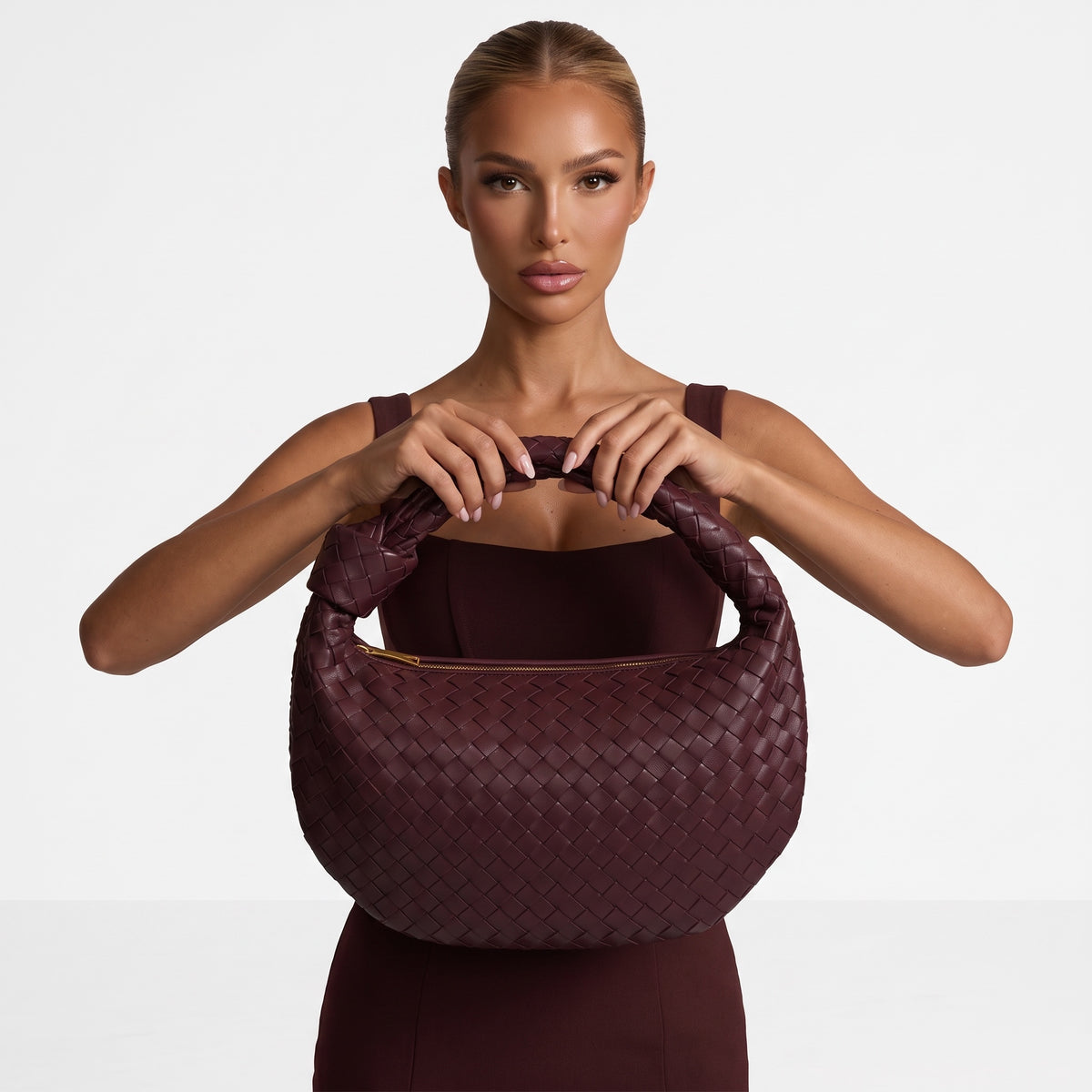 burgundy intrecciato hobo bag with padded handle and top zip