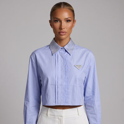 Prada light blue cropped shirt with crystal‑embellished collar and Prada triangle patch