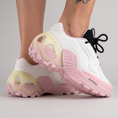 White and pink Adidas chunky platform sneaker with sculpted adiPRENE+ sole and black tongue