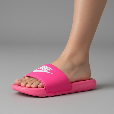 Hot pink Nike slide sandal with white Nike logo