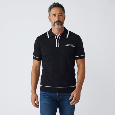 Black Alexander McQueen short-sleeve knit polo with white trim and chest MQUEEN embroidery