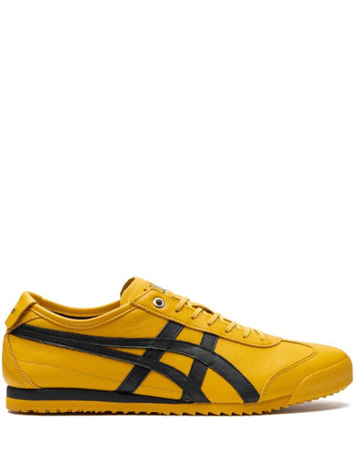 Yellow Onitsuka Tiger Mexico 66 sneaker with black stripes side view