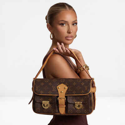 Louis Vuitton monogram shoulder bag with tan trim and gold hardware