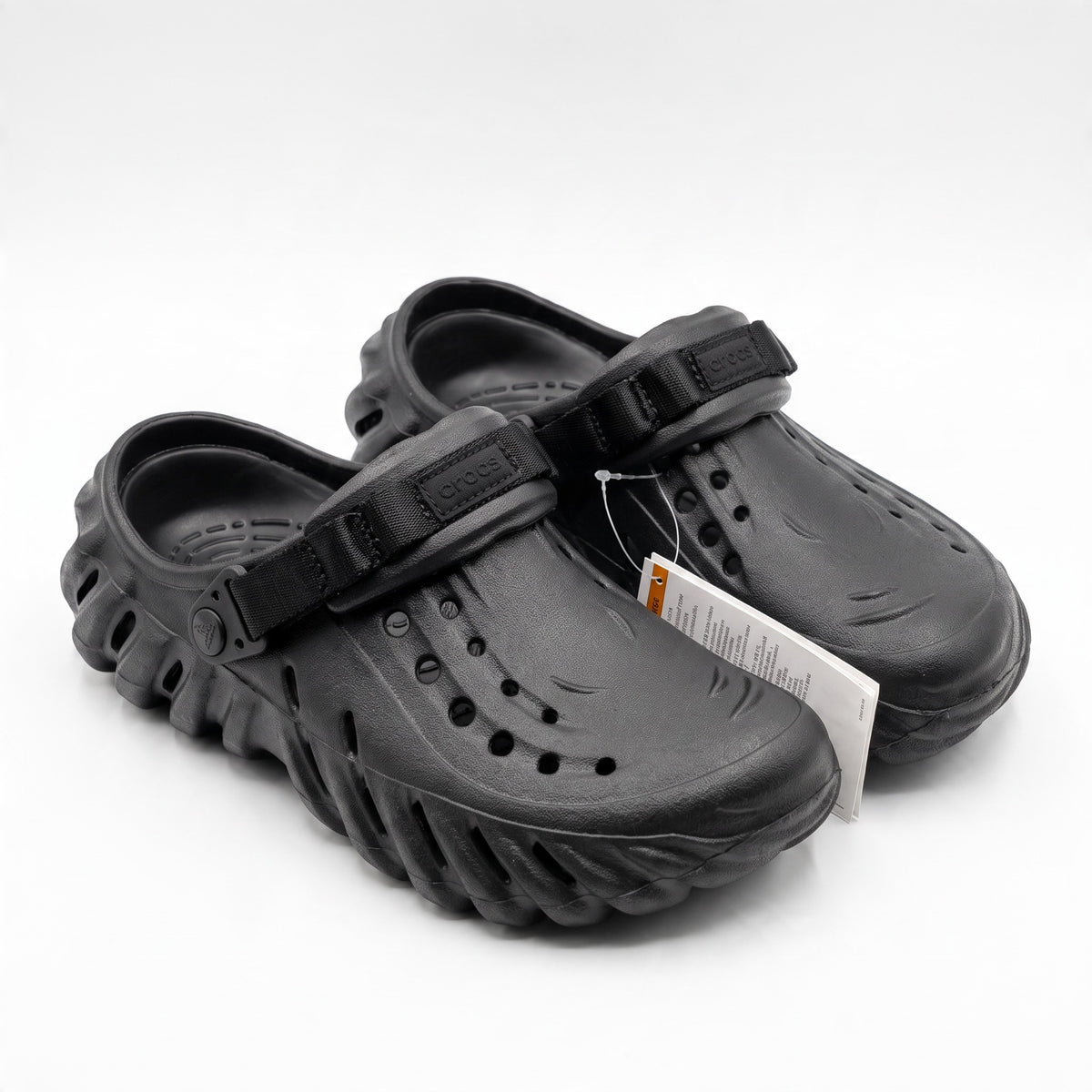 black Crocs clogs with adjustable strap and ventilated upper