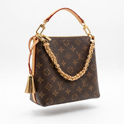 Louis Vuitton brown monogram shoulder bag with gold chain and tassel