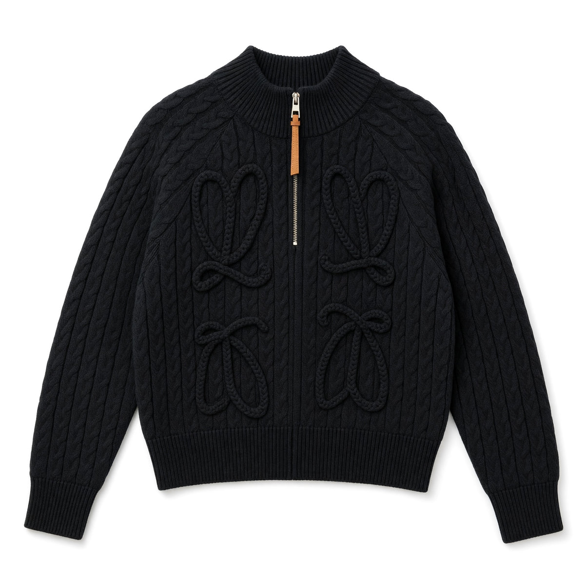 black cable knit zip sweater with tan leather zipper pull and braided loop details
