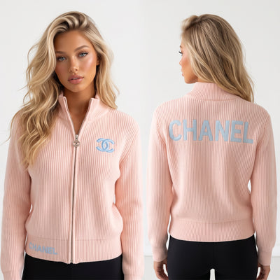 pink Chanel zip knit jacket with CC logo on chest and CHANEL lettering on back