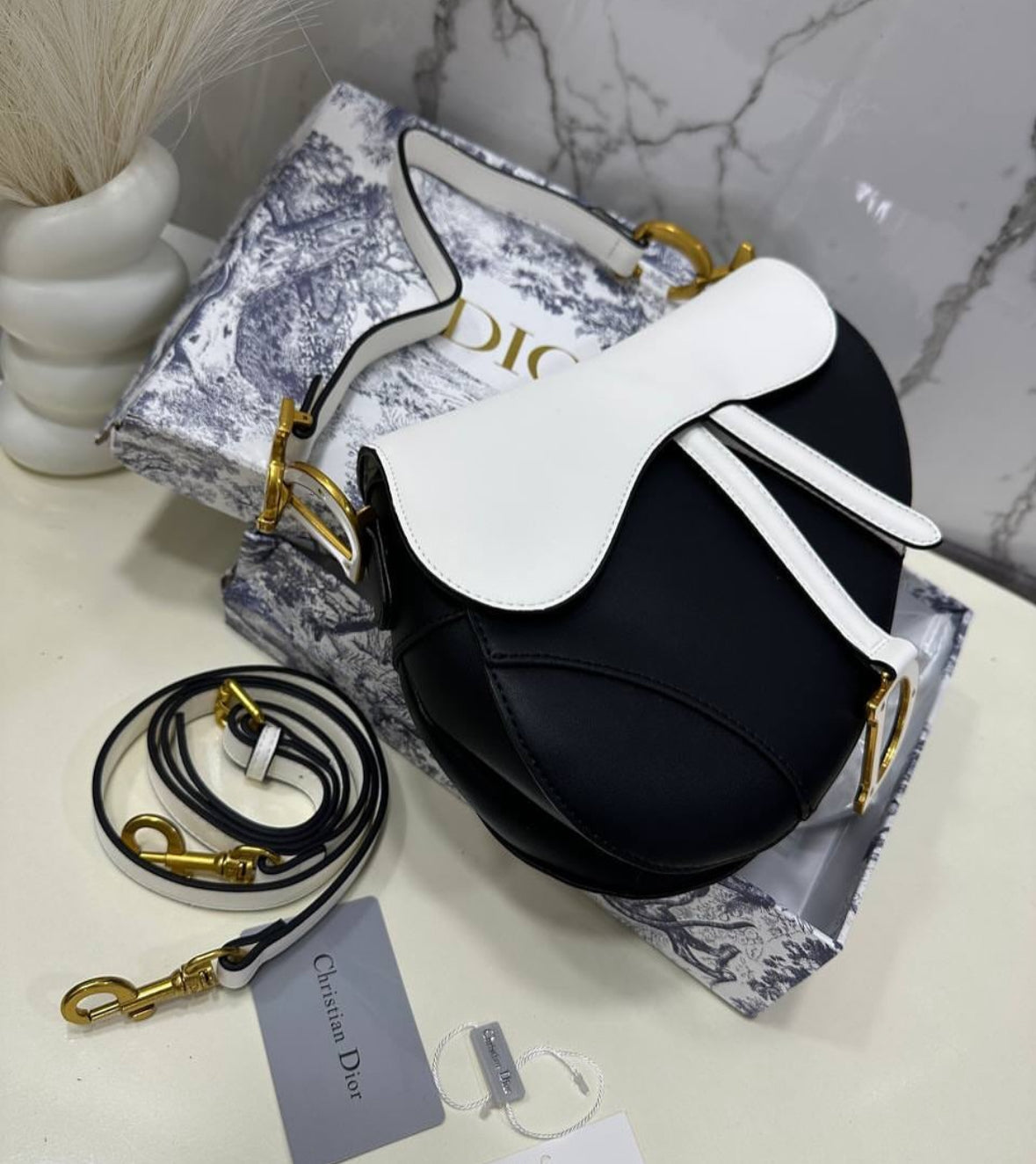 Dior Saddle Bag in Black and White Leather with Gold Hardware