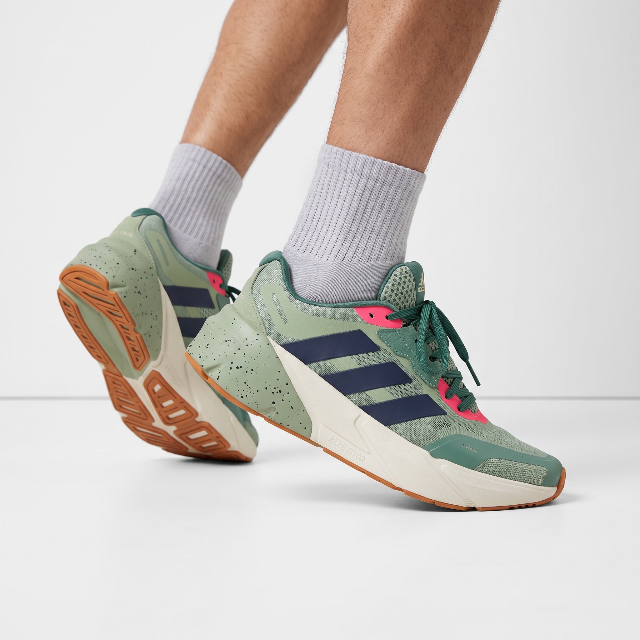 Adidas chunky runner sneaker in sage green with teal and navy accents