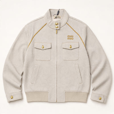 Miu Miu sand beige bomber jacket with gold piping and buttons, front view