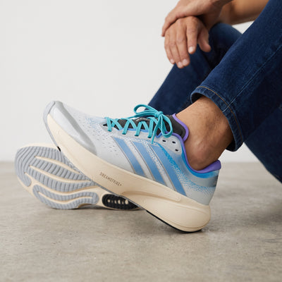 adidas pale blue and cream Dreamstrike+ sneaker side view
