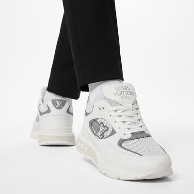 White and grey Louis Vuitton men's sneaker with LV badge and chunky sole