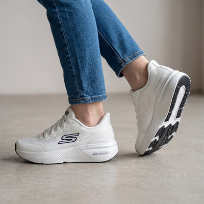 White Skechers Max Cushioning sneakers with thick sole and textured upper